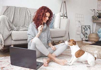 Woman displaying, how to take care of a dog in an apartment
